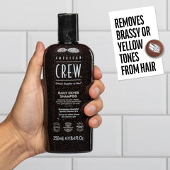 Botella de American Crew con fórmula vegana para cabello masculino.