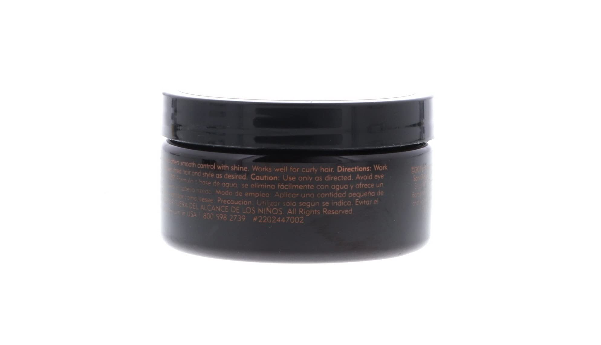 American Crew Pomade étiquette visible indiquant les usages rapides et conseils.