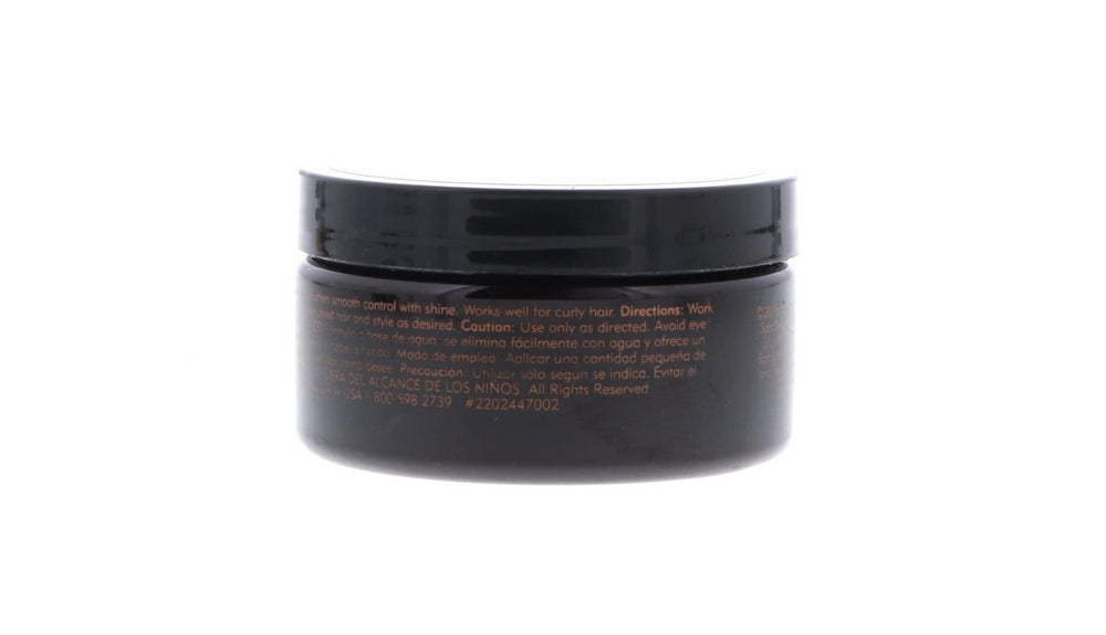 American Crew Pomade étiquette visible indiquant les usages rapides et conseils.