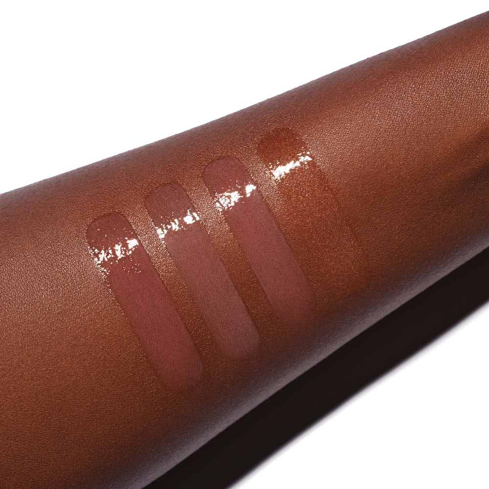 Anastasia Beverly Hills brillo-labios-envase cristal, fácil de llevar.