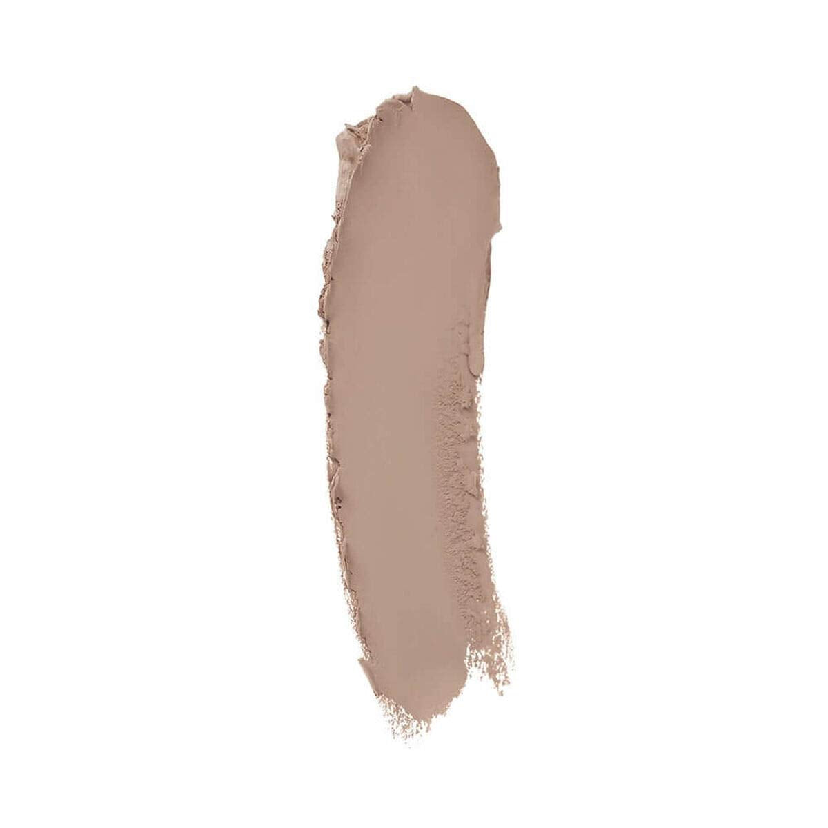 Texture crème du fond de teint bâton Mink qui se fond rapidement sur la peau