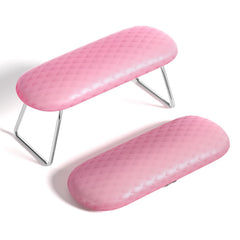 Reposabrazos AORAEM para uñas rosa ofrece soporte cómodo para sesiones de manicura.