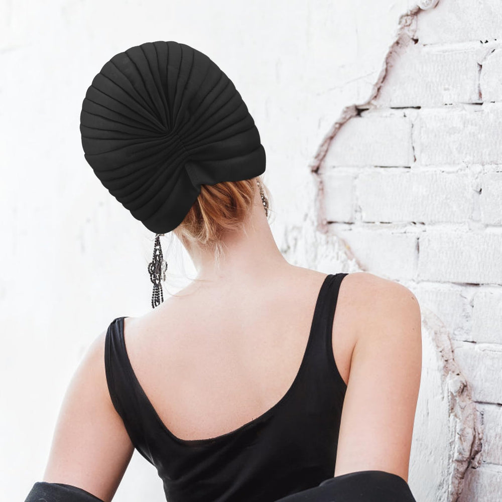 AQOKKA turbante talla 52-60 cm con altura de 18 cm.