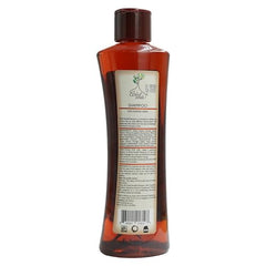Árbol Verde Champú Nutre Raíz para brillo y vitalidad.