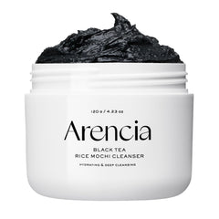 ARENCIA Black Tea Rice Mochi Cleanser bottle close-up showing gentle exfoliation for smoother pores.