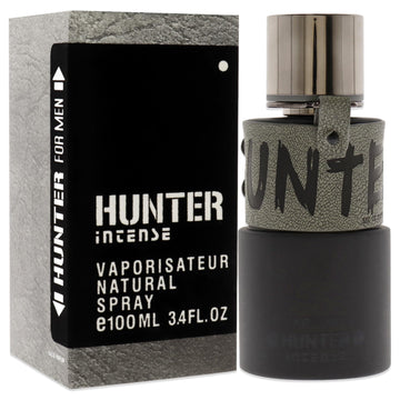 Armaf Hunter Intense, atomizador en uso, pulverización precisa para la aplicación diaria.