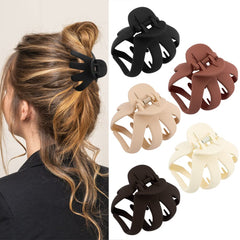 Pinzas Pulpo Atoden grandes y mates para cabello grueso con agarre seguro.