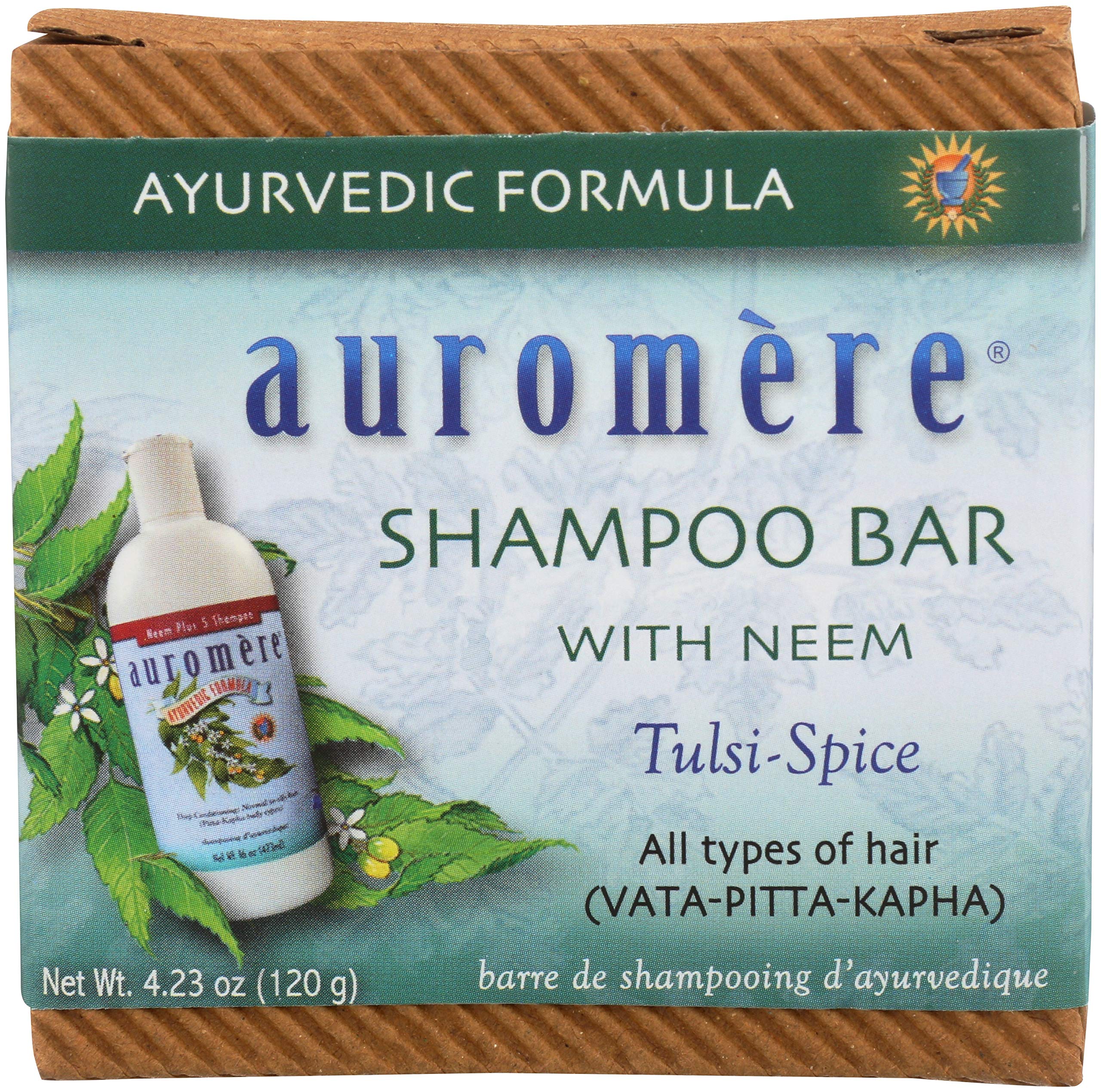 Barra Auromere shampoo, envase cero residuos, ideal para viajes.