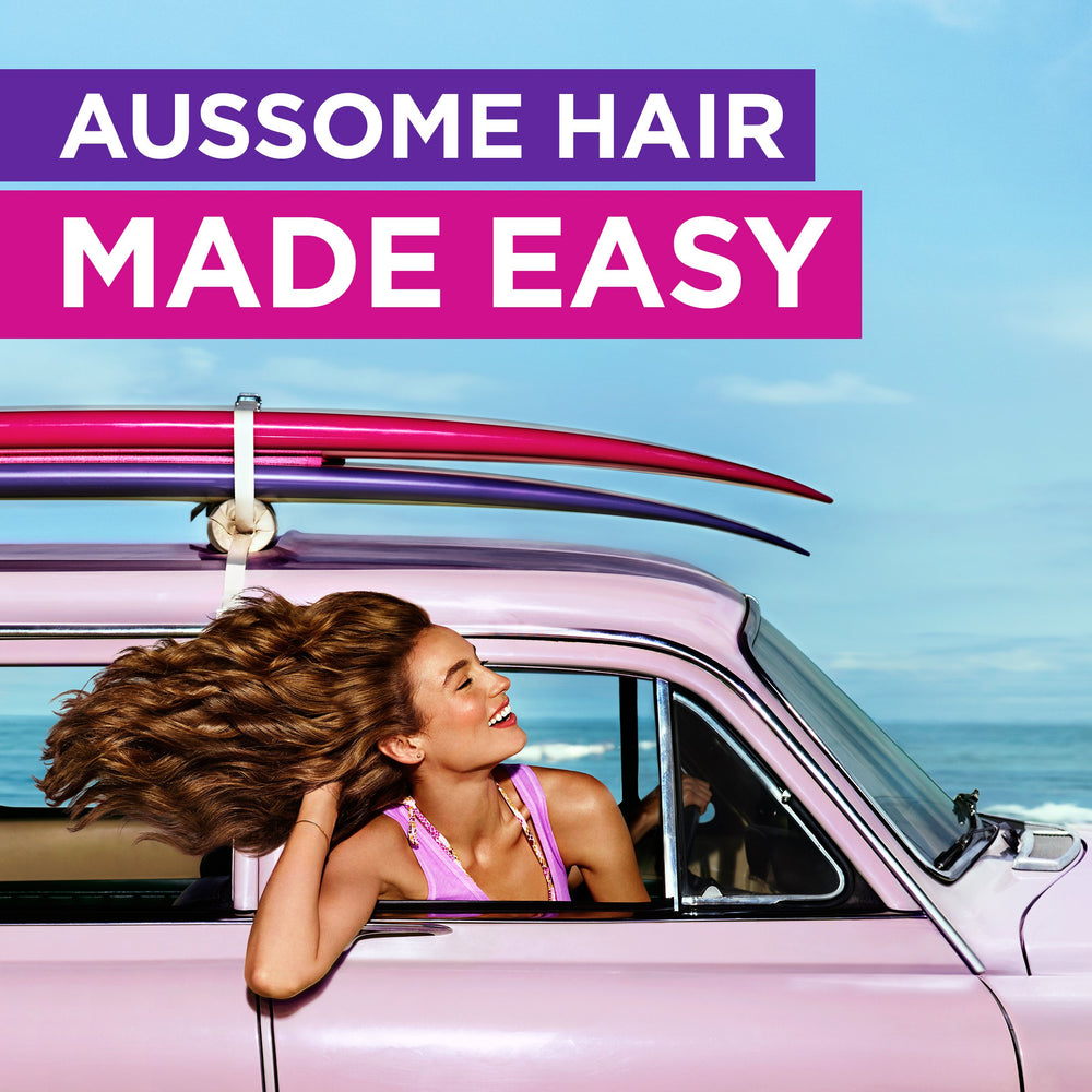 Aussie Headstrong volumen completo para coletas y peinados voluminosos.