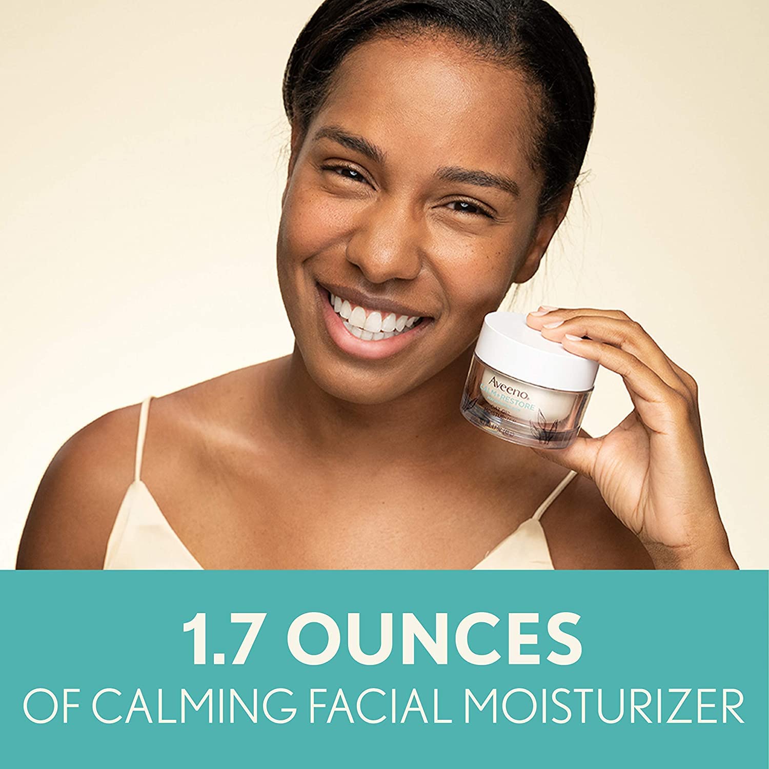 Envase de 1.7 oz de Aveeno Calm + Restore para piel sensible.