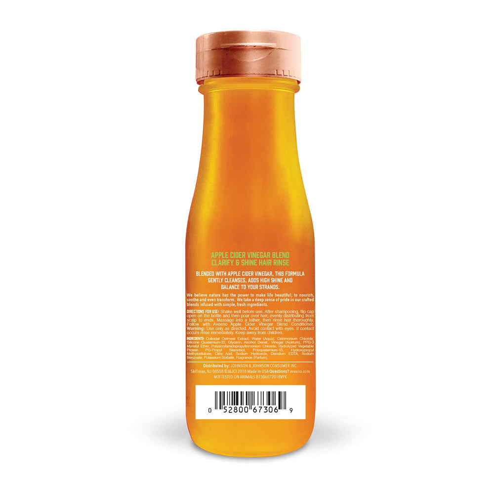 Aveeno Enjuague en ducha, vertido, distribuye de la raíz a las puntas.