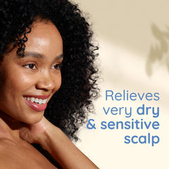 Champú calmante de Aveeno, aplicación diaria para cabello seco y sensible.