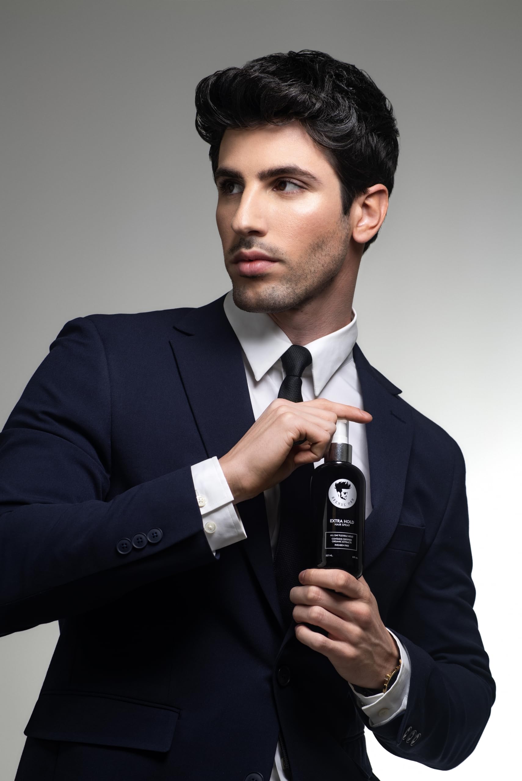Avenue Man hair spray mist dispersion showing even coverage and fast drying.