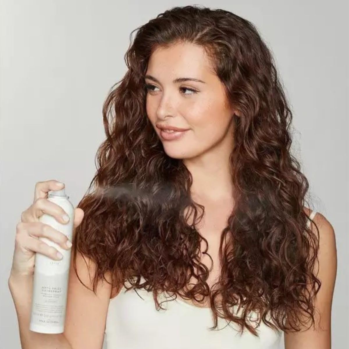 Awapuhi Wild Ginger spray con Keratriplex para balance de humedad y suavidad.