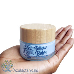AzulBotanicals bálsamo sebo res aplicado en la piel para cuidado diario.