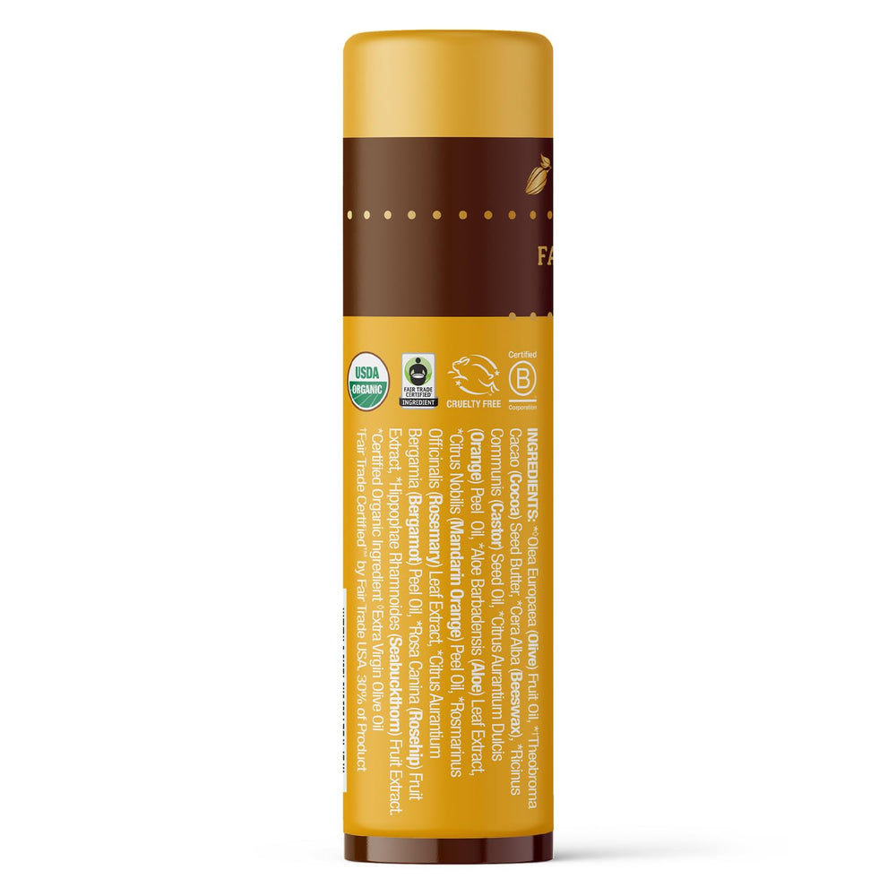 Bálsamo labial Badger con cacao y aceite de oliva para labios suaves.