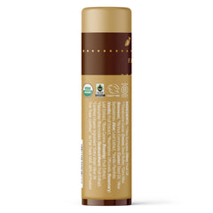 Aplicación suave de bálsamo Badger Vanilla para labios secos.