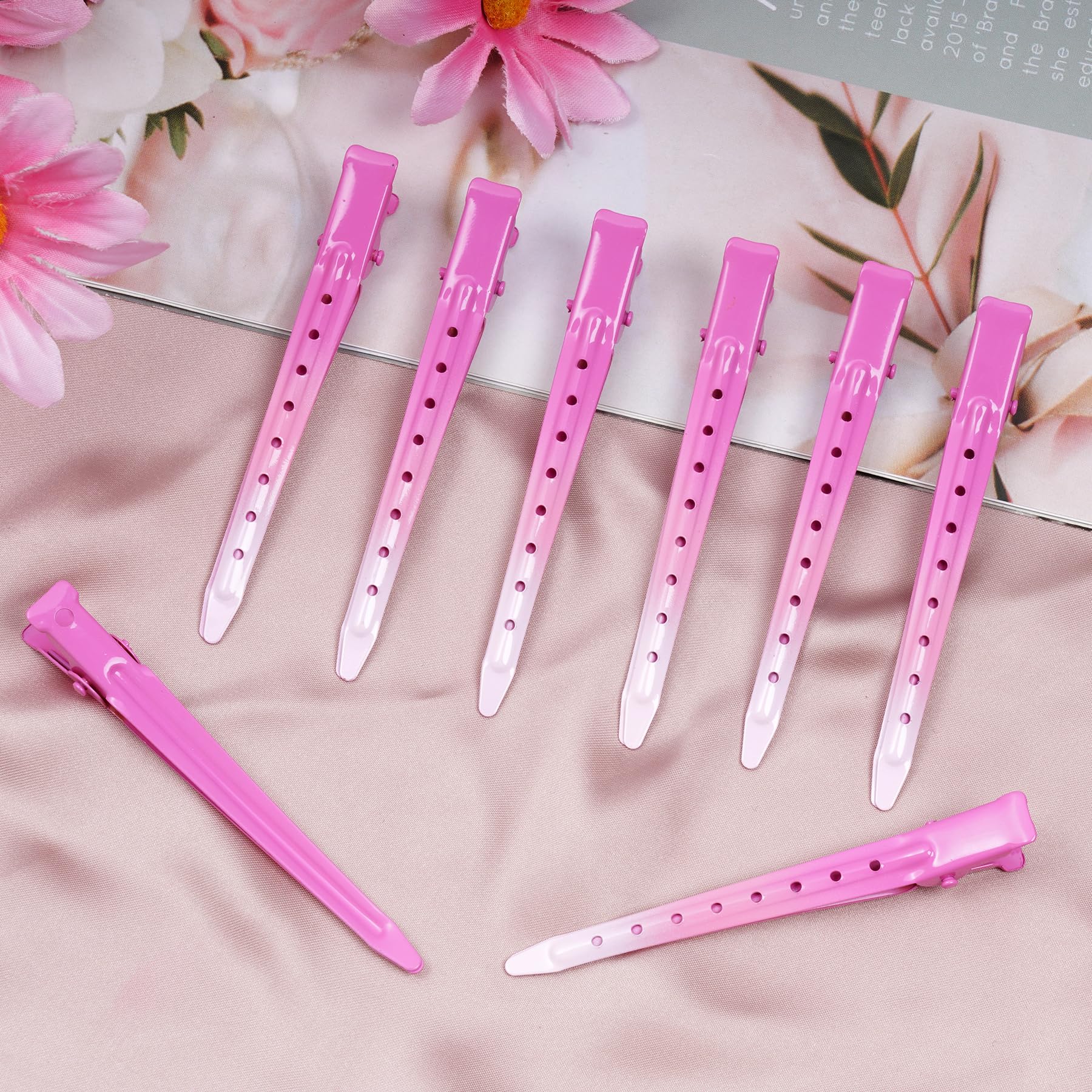 Pinza Bantoye ganso rosa para seccionar cabello durante peinado y coloración
