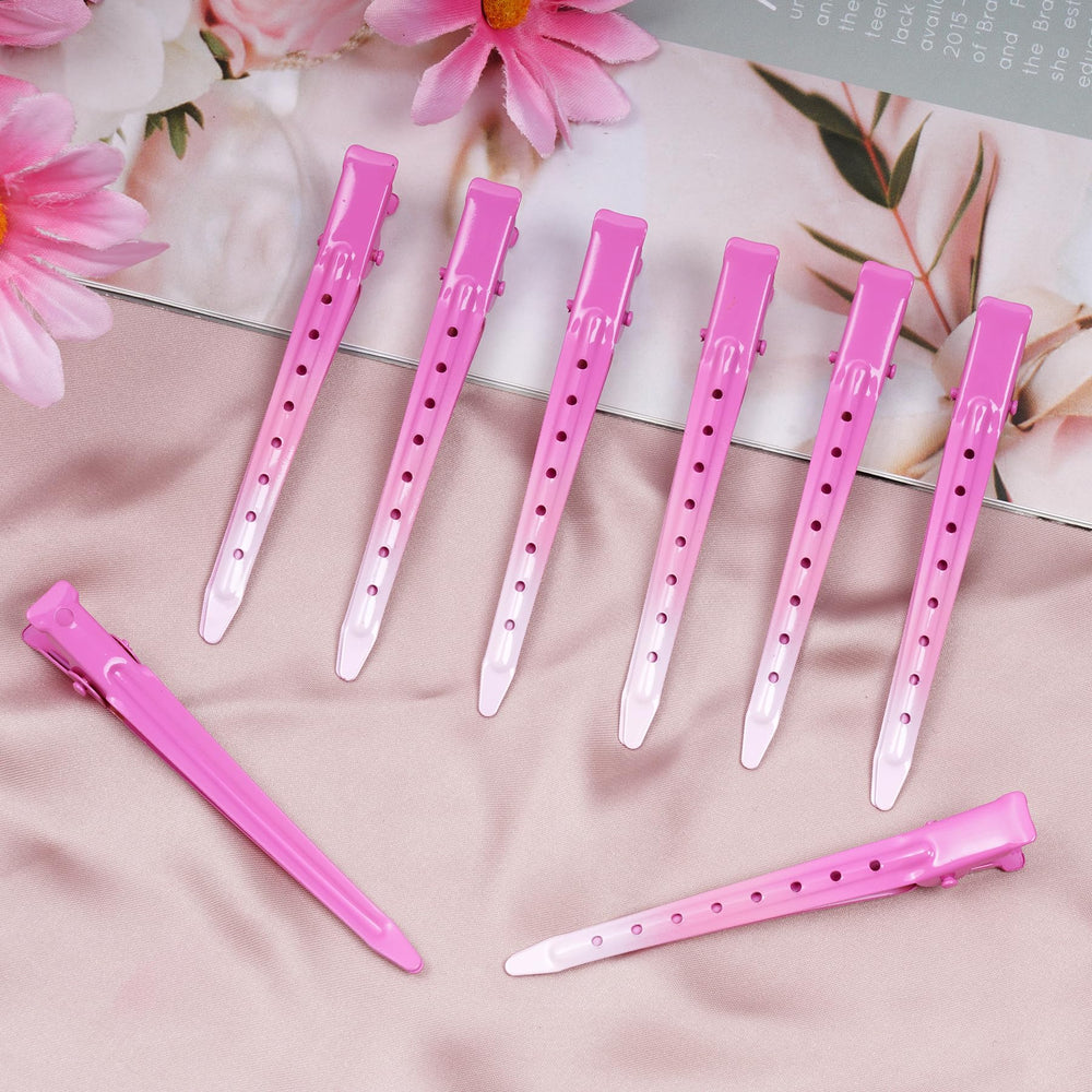 Pinza Bantoye ganso rosa para seccionar cabello durante peinado y coloración
