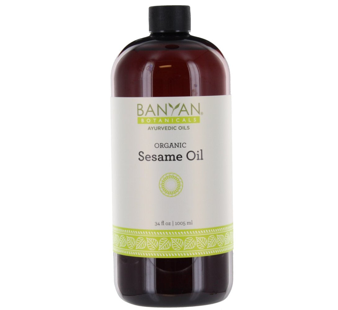 Banyan Botanicals aceite de sésamo dorado para masaje corporal suave.