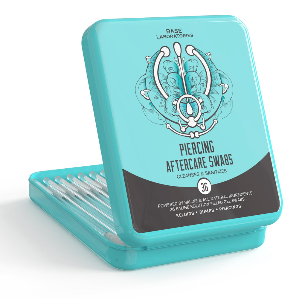 BASE LABORATORIES, hisopos gel salino para piercings, limpieza suave y segura.