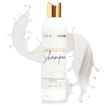 BASK & LATHER Strengthen Shampoo bottle front view, highlighting an all-natural formula.