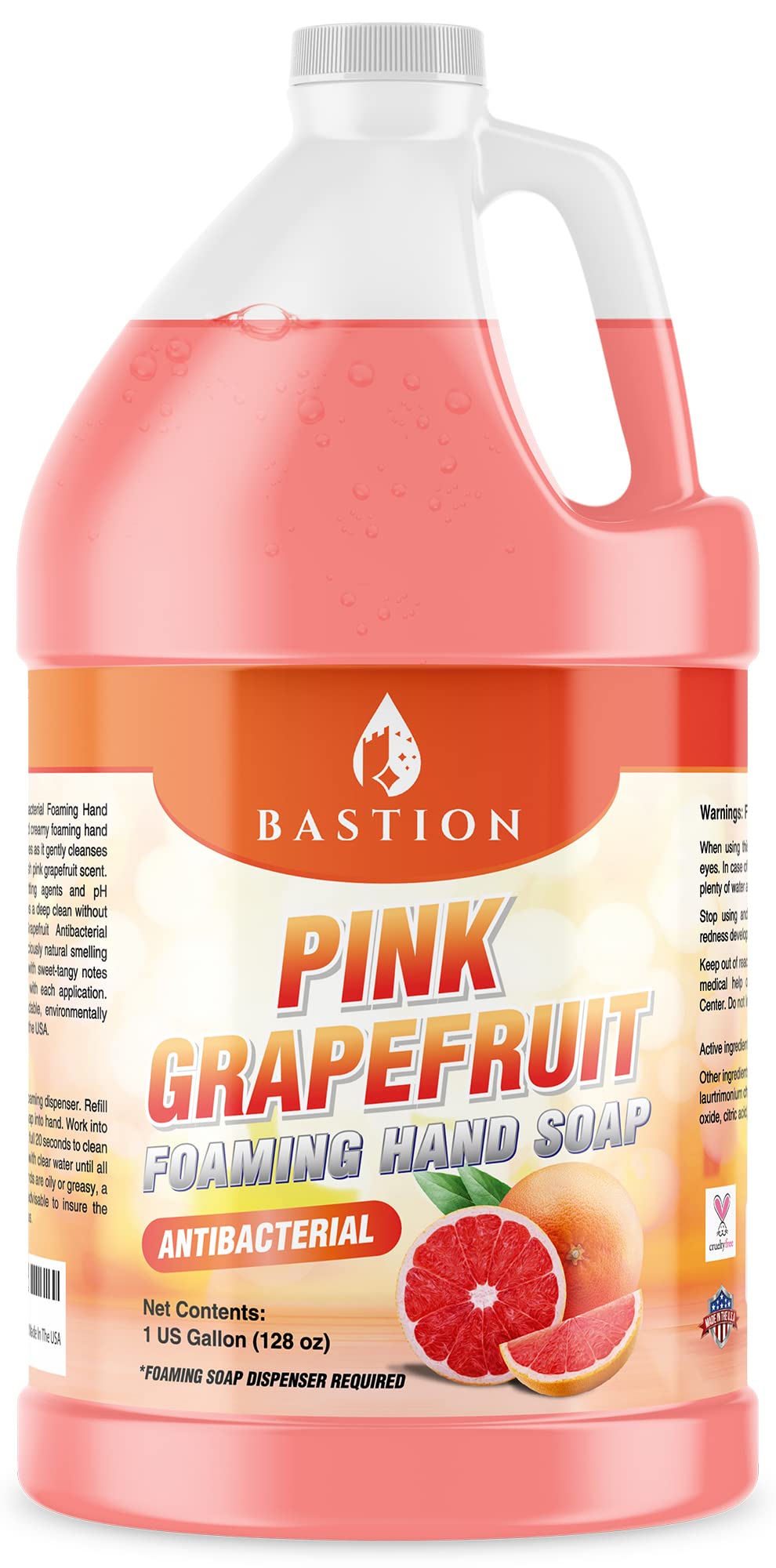 Jabón Bastion espumoso de pomelo rosado en botella, limpieza profunda y fragancia fresca.