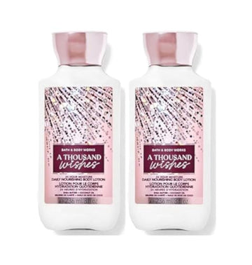 Loción Bath & Body Works A Thousand Wishes en botella, hidratación suave y fragancia duradera.