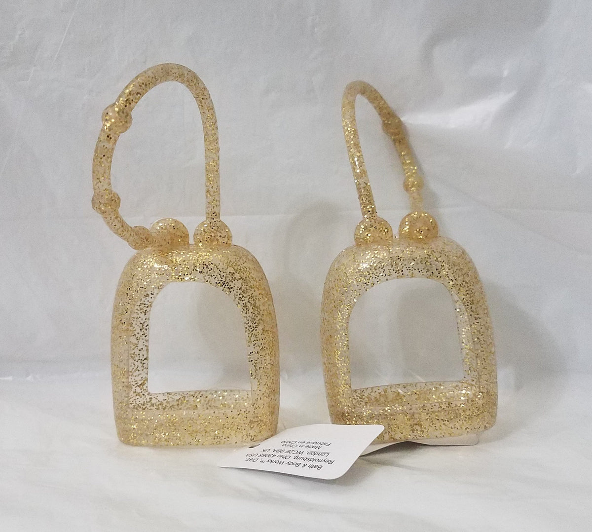 Bath & Body Works porta PocketBac dorado brillante, listo para llevar gel desinfectante con estilo