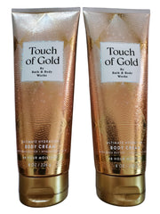 Bath & Body Works Toque de Oro crema corporal frente del envase, hidratación diaria.