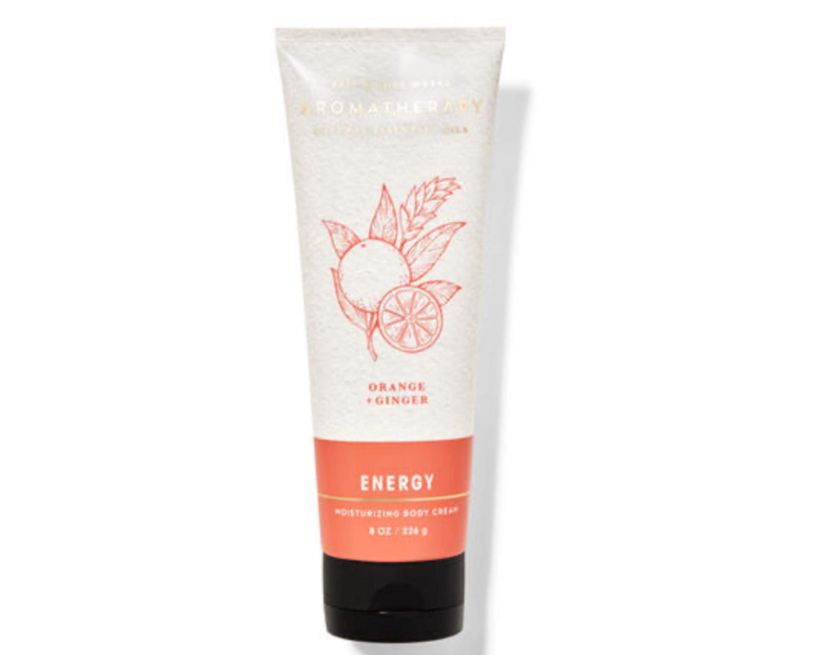Bath & Body Works crema corporal aromaterapia energizante con naranja y jengibre, hidratación 24 horas.