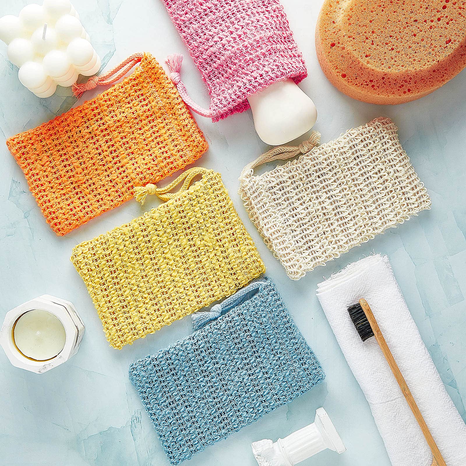 BBTO bolsa exfoliante para jabón en amarillo, facilita secado rápido tras el uso.