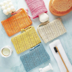 BBTO bolsa exfoliante para jabón en amarillo, facilita secado rápido tras el uso.