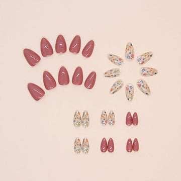 BDKAIWU detalle del arte floral en las uñas para un look sofisticado.