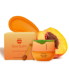 Bee Balm Original Lip Balm Peach Honey Pot hydrates dry lips.