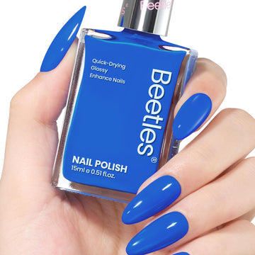 Beetles Esmalte en Gel Azul, botella y pincel para una aplicación suave.