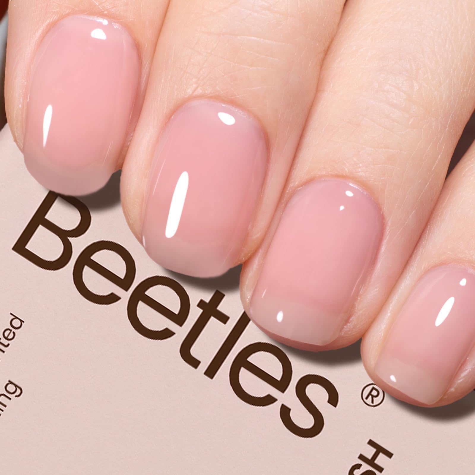 Beetles Esmalte Gel Rosa Translúcido en botella, acabado suave para uñas.