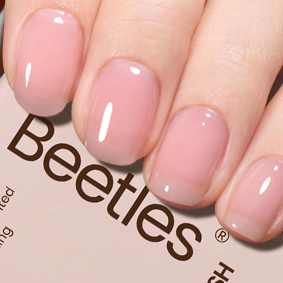 Beetles Esmalte Gel Rosa Translúcido en botella, acabado suave para uñas.