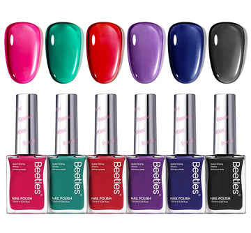 Beetles Gel Polish on nails during a quick-dry manicure.