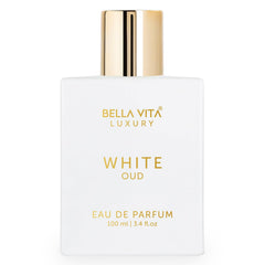 Bella Vita Luxury White Oud, botella de perfume en primer plano, aroma duradero para todo el día.