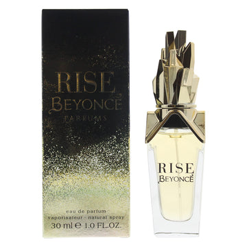 Beyoncé Rise: detalles dorados en la botella para un aspecto lujoso.
