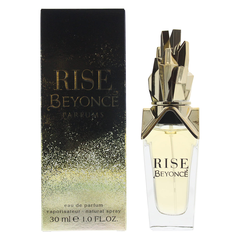 Beyoncé Rise: detalles dorados en la botella para un aspecto lujoso.