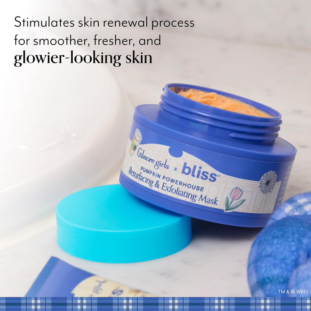 Bliss Gilmore Girls diadema spa a cuadros mantiene el cabello recogido durante la rutina.