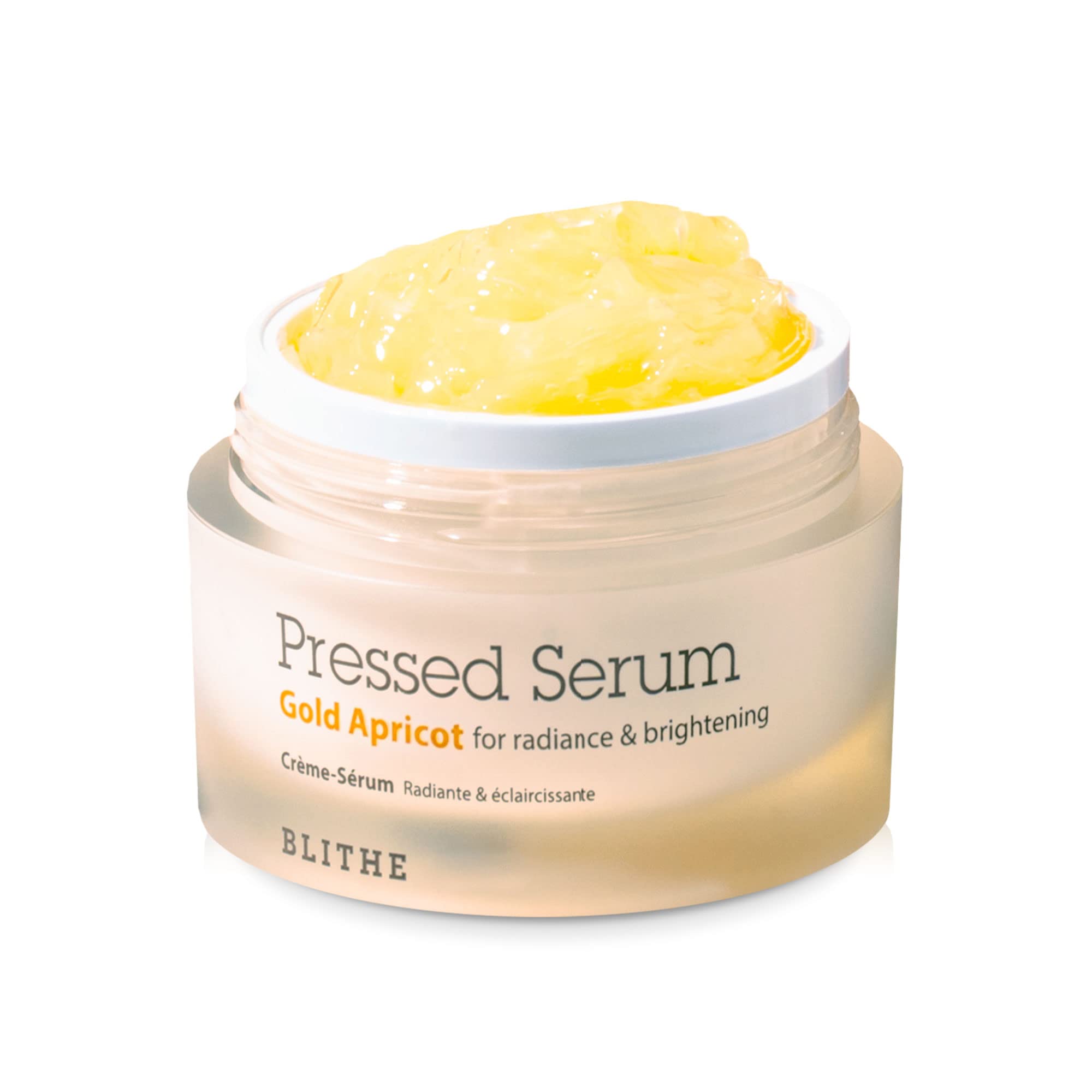 BLITHE serum prensado oro albaricoque en botella para luminosidad suave.