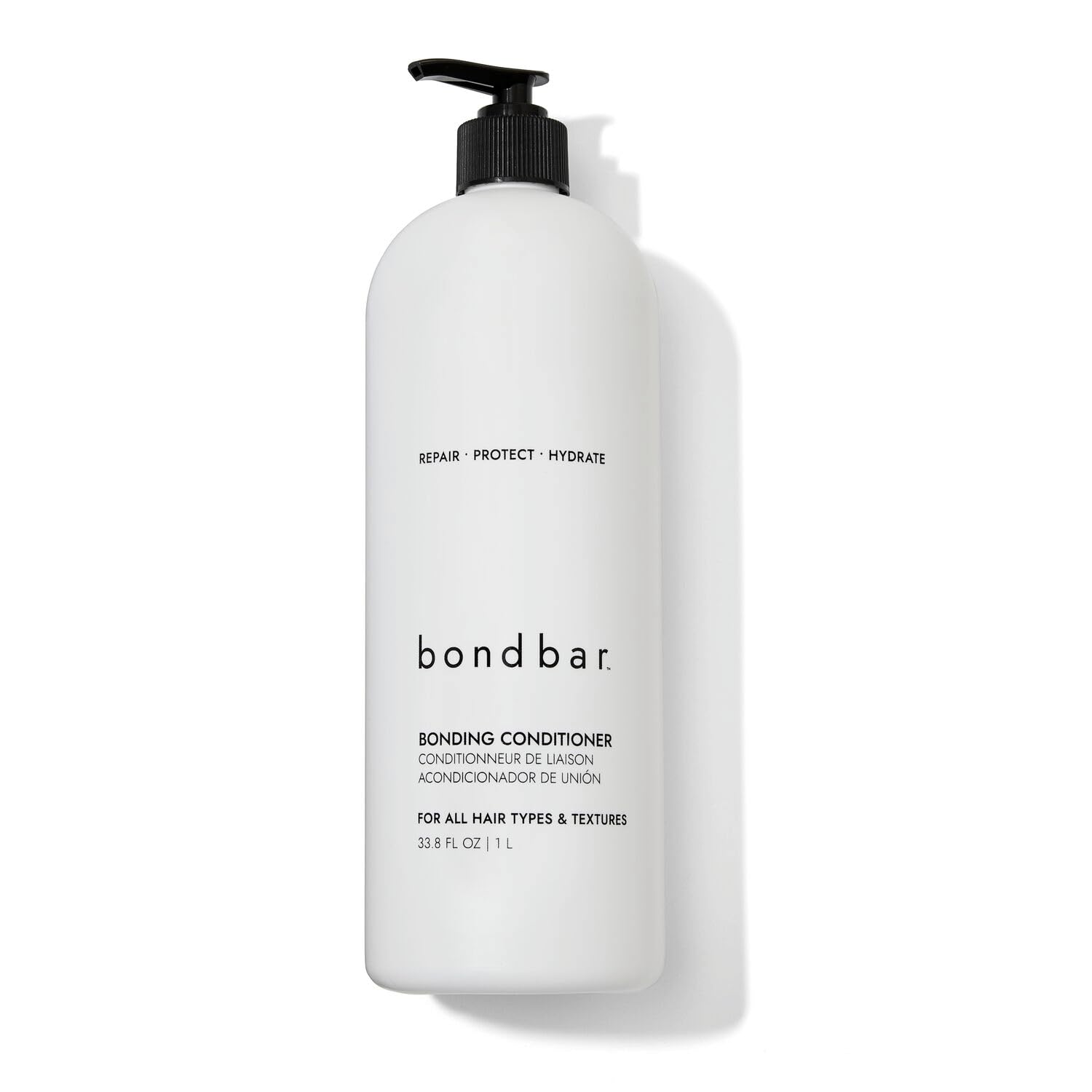 Acondicionador Bondbar para cabello dañado, textura cremosa que aporta suavidad.