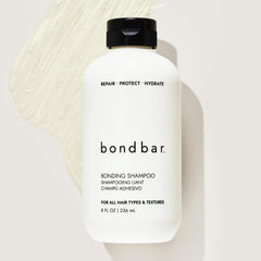 Bondbar Repairing Shampoo on wet hair with strands looking smooth