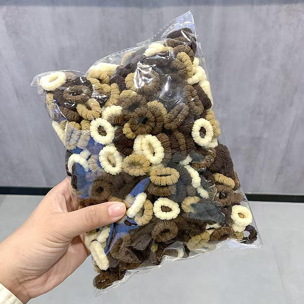 Regalo práctico con Borsicge: ligas coloridas para niñas.