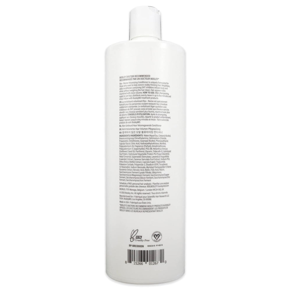 Botella BosRevive en baño, cabello con cuerpo y brillo.