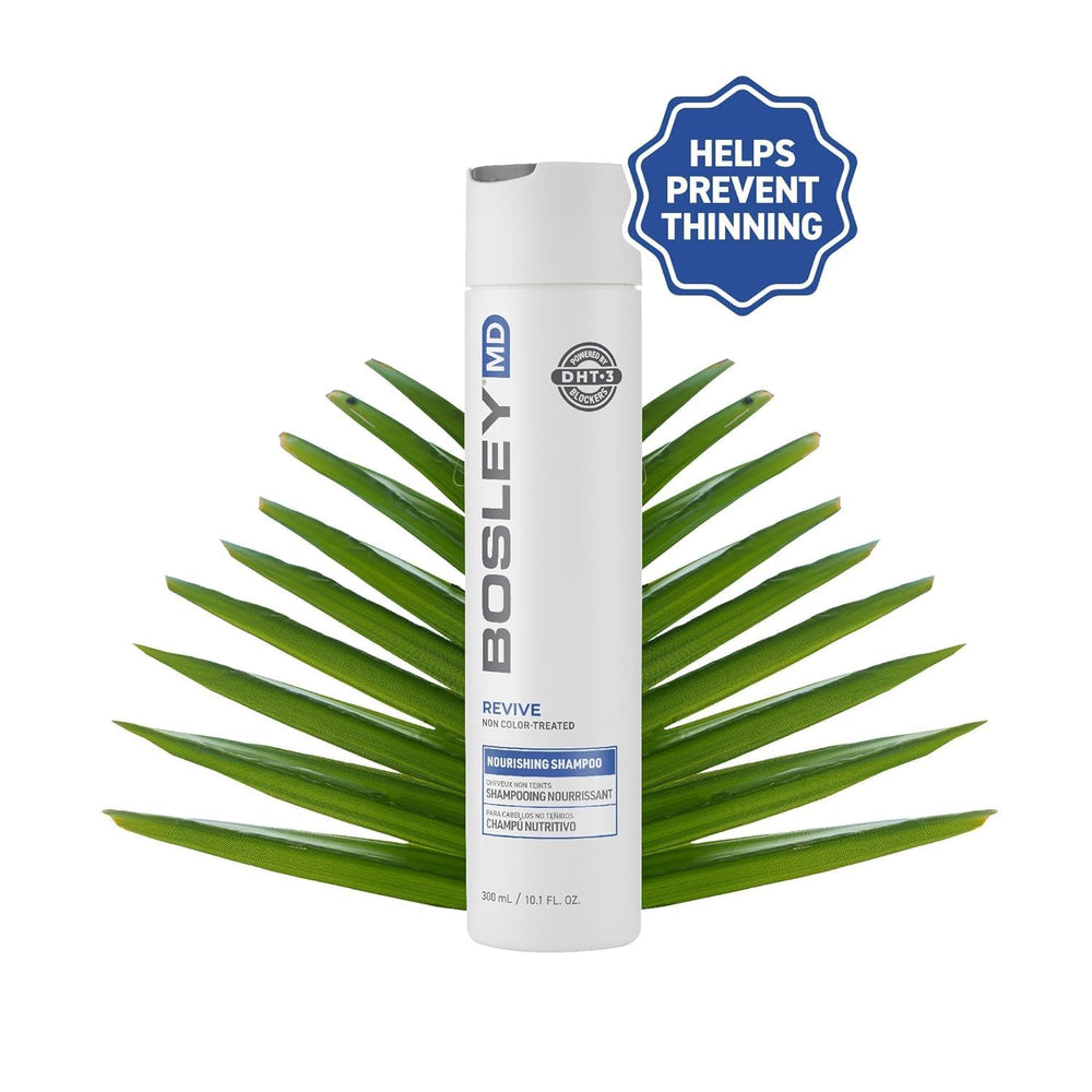 BosRevive Nourishing Shampoo lather in hand showing gentle cleansing for thinning hair.