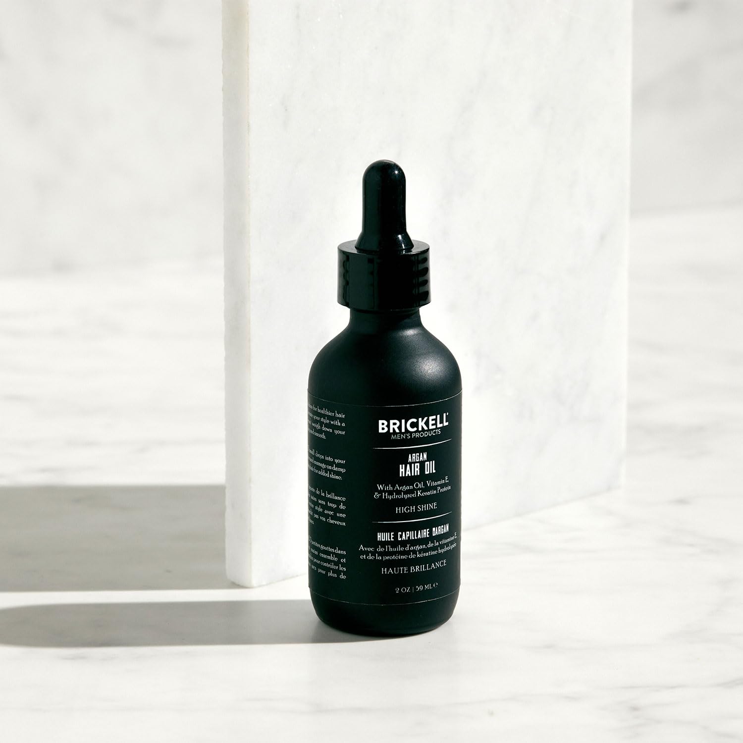 Brickell Aceite de Argán para cabello, puntas suavizadas y daño reducido.